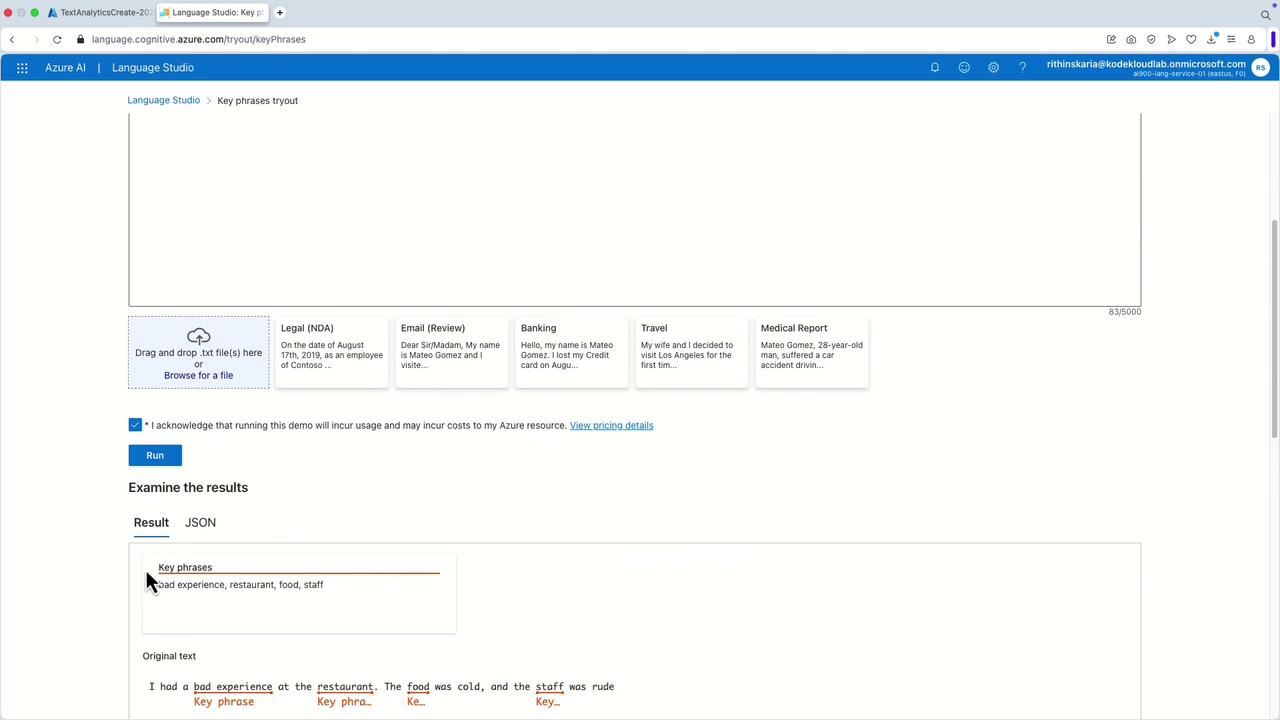 The image shows a screenshot of the Azure Language Studio interface, specifically the Key Phrases tryout section, with a text input and key phrases extracted from a sample review.