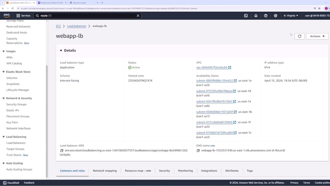 The image shows an AWS Management Console page displaying details of a load balancer named "webapp-lb," which is an internet-facing application load balancer with an active status. It includes information about the VPC, availability zones, IP address type, and creation date.