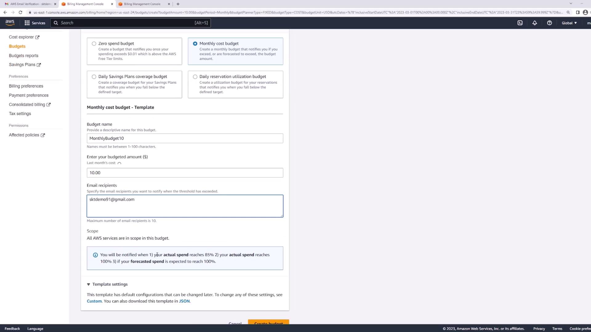 The image shows an AWS Billing Management Console screen where a user is setting up a monthly cost budget with a budgeted amount of $10 and an email recipient for notifications.