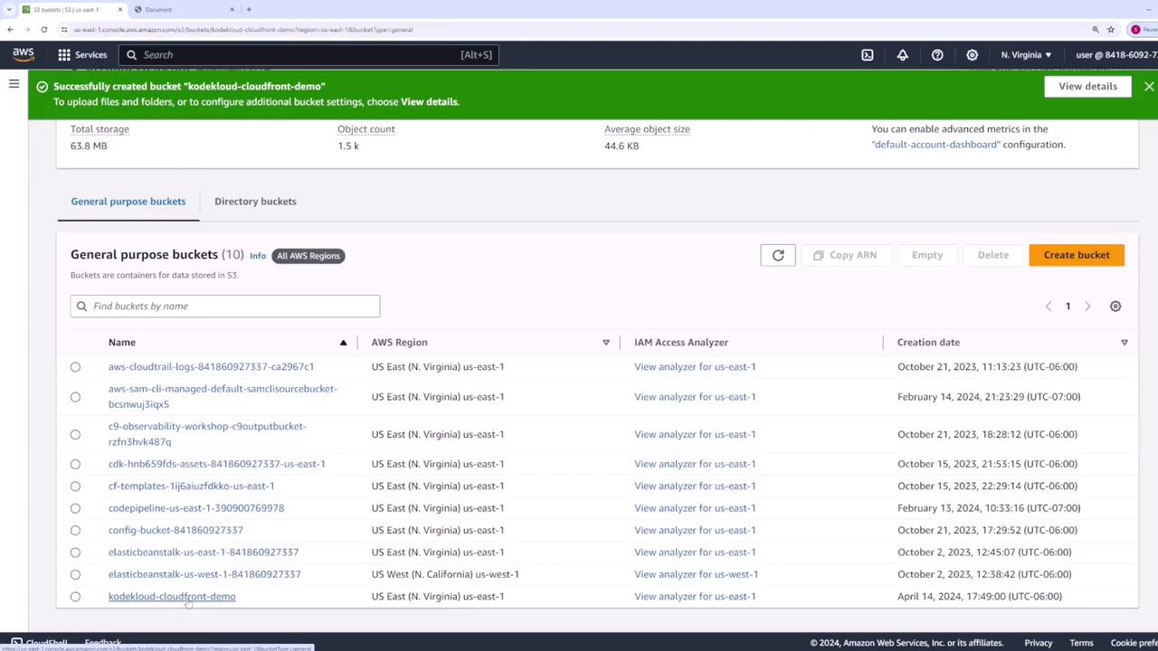The image shows an AWS S3 management console with a list of general-purpose buckets, including details like bucket names, AWS regions, and creation dates. A green notification bar at the top indicates the successful creation of a bucket named "kodekloud-cloudfront-demo."