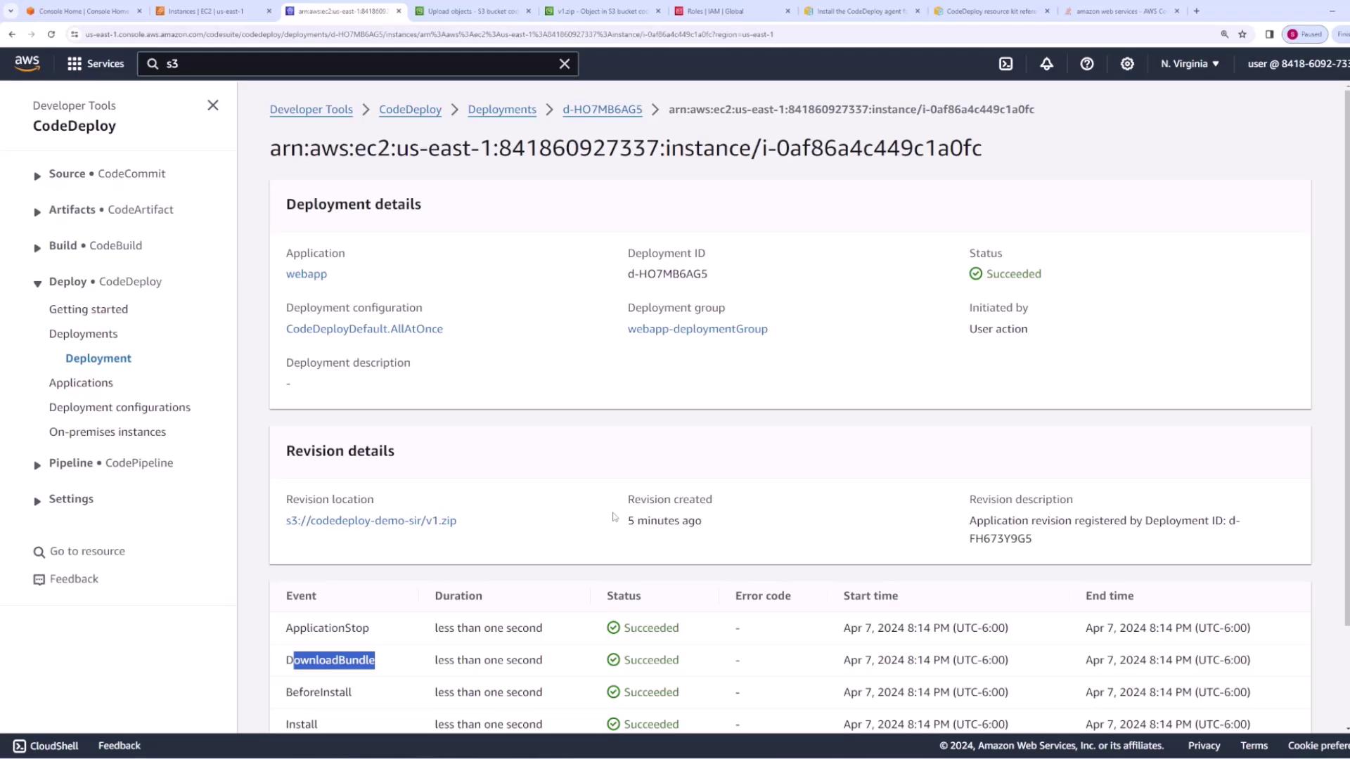 The image shows an AWS CodeDeploy console with deployment details for an application named "webapp," indicating a successful deployment. It includes information about the deployment configuration, group, and revision details, along with a list of deployment events and their statuses.