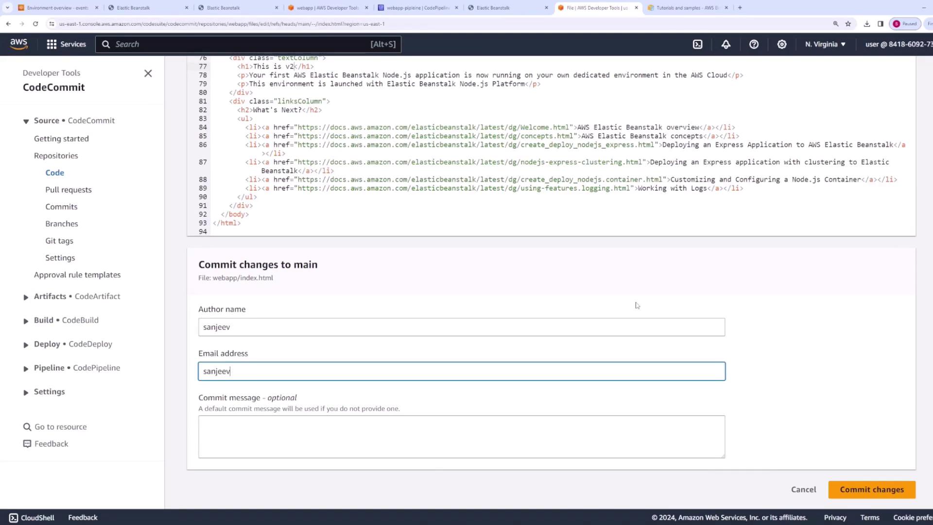 The image shows the AWS CodeCommit interface with an HTML file being edited.