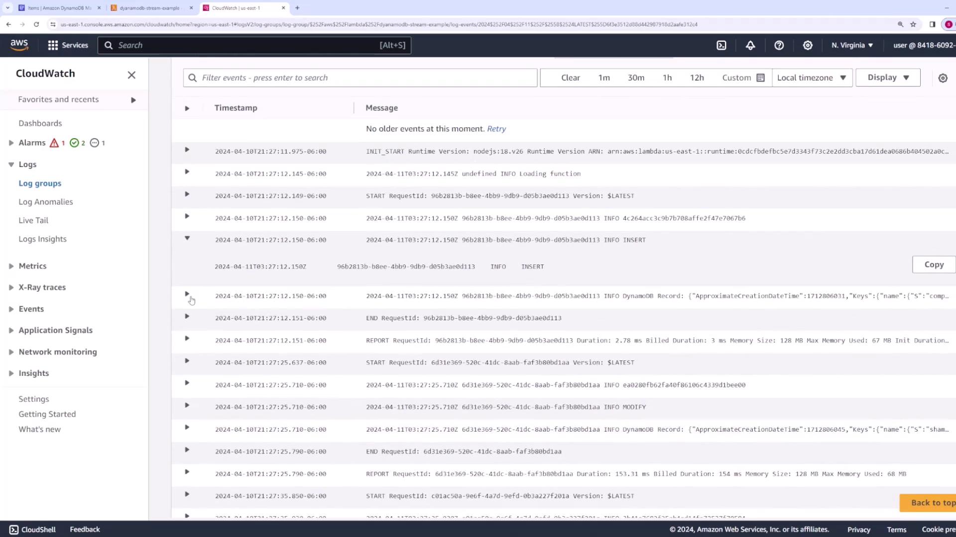 The image shows an AWS CloudWatch Logs dashboard displaying log entries with timestamps and messages. The interface includes options for filtering and navigating through log data.