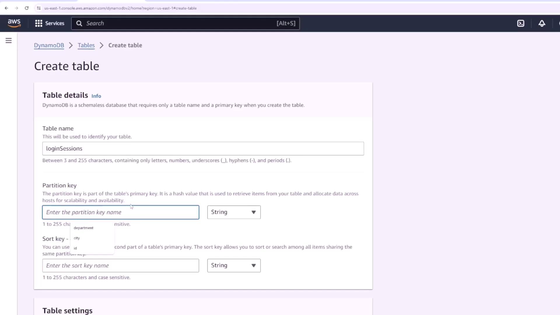 The image shows a screenshot of the AWS DynamoDB console, specifically the "Create table" page, where a user is entering details like table name, partition key, and sort key.