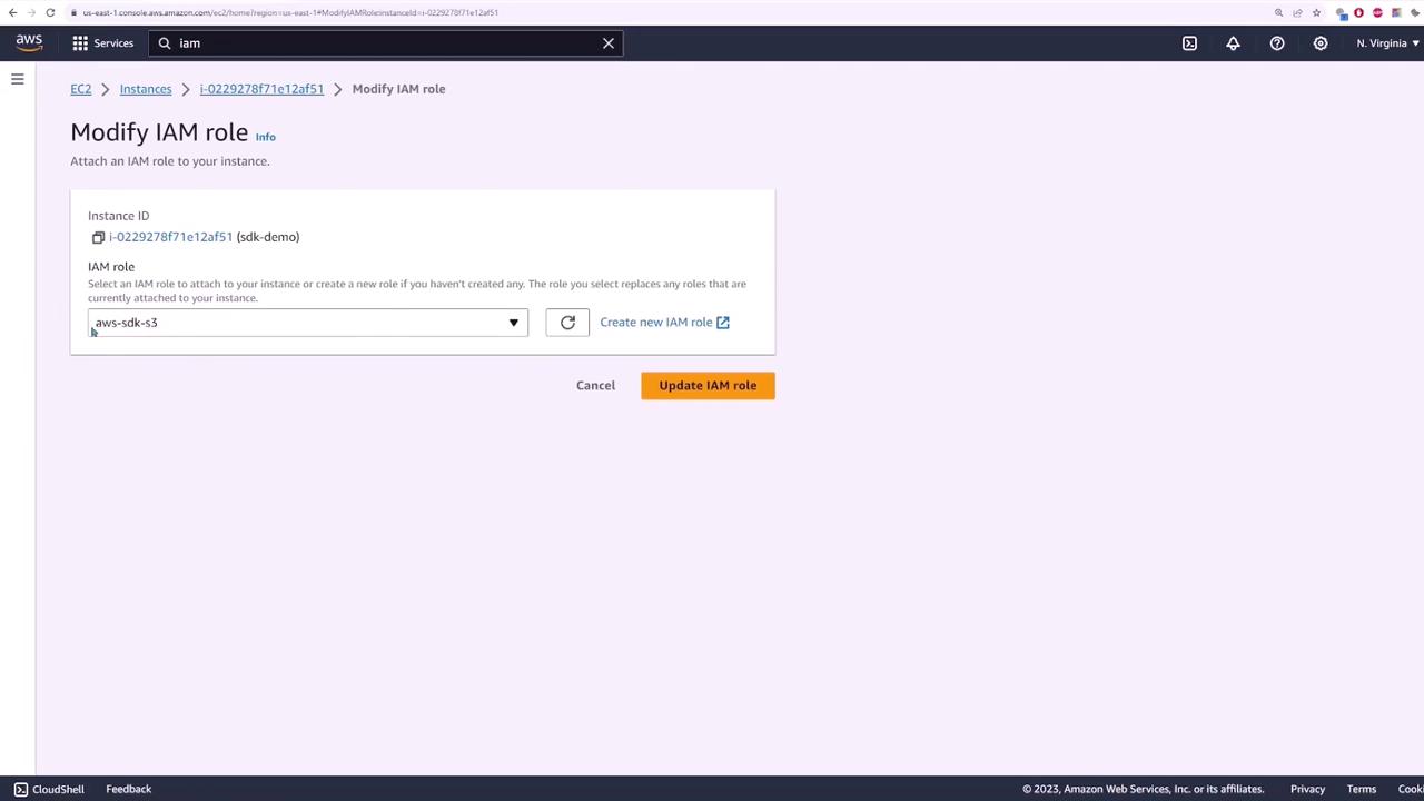 The image shows an AWS console screen where a user is modifying the IAM role for an EC2 instance. The instance ID is displayed, and an IAM role named "aws-sdk-s3" is selected.