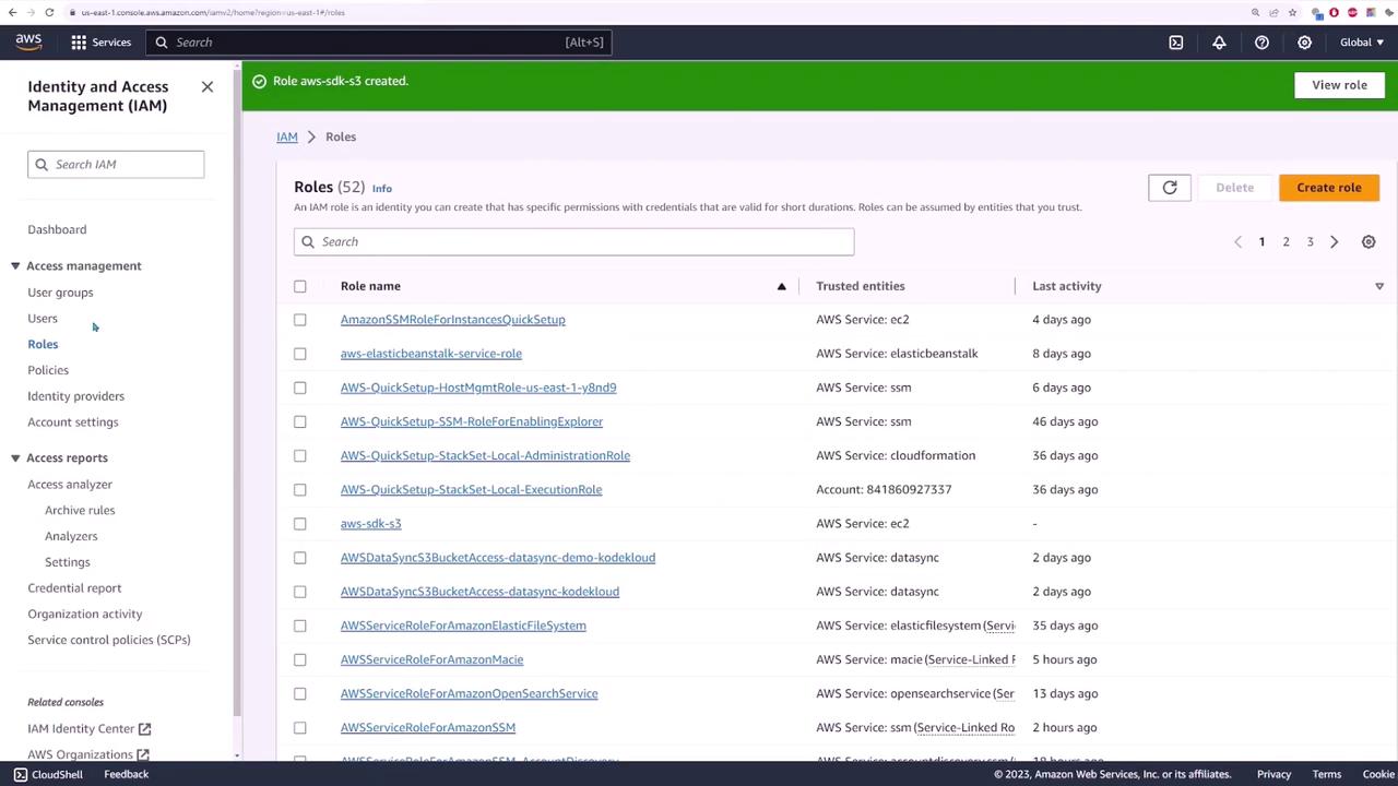The image shows the AWS Identity and Access Management (IAM) console, specifically the "Roles" section, listing various IAM roles with their trusted entities and last activity details.