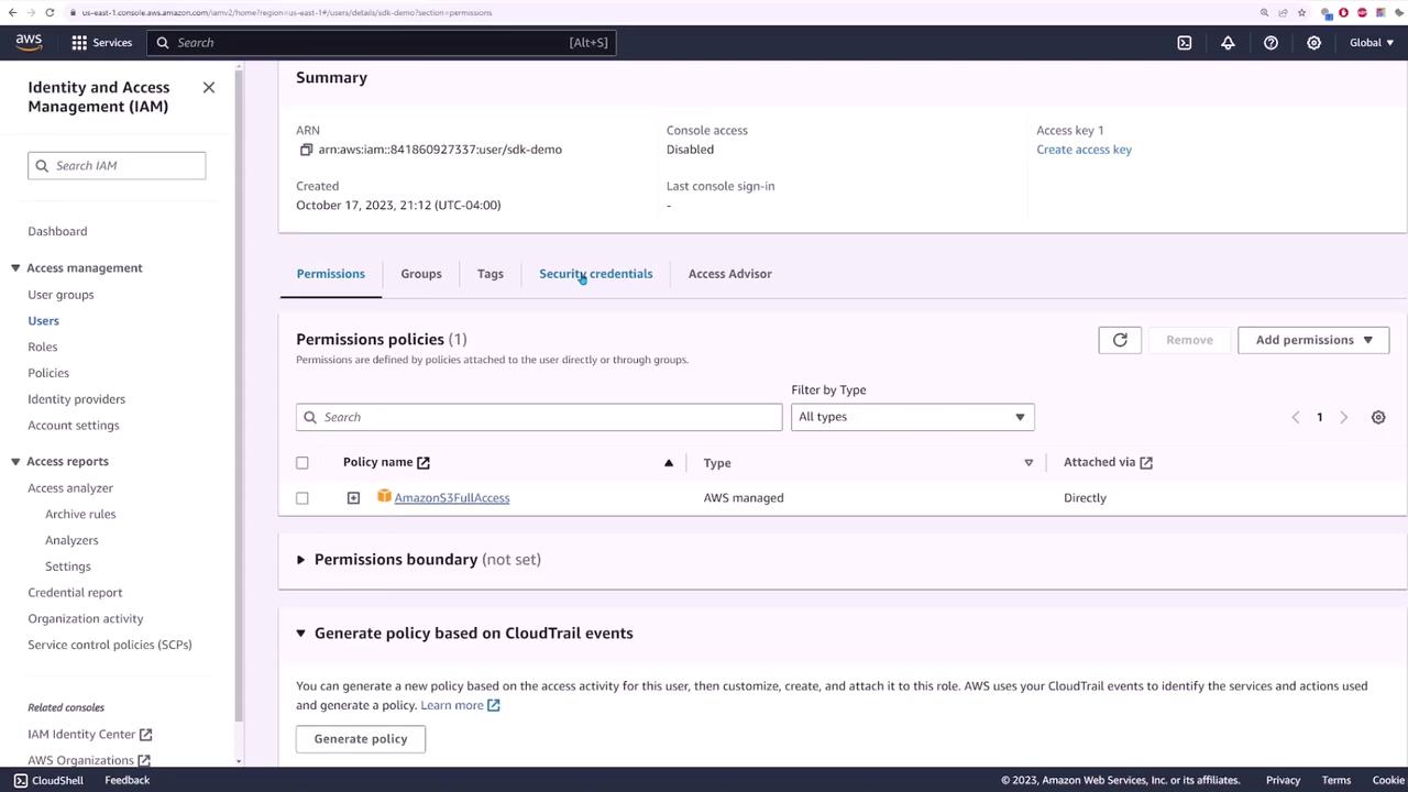 The image shows an AWS Identity and Access Management (IAM) console screen, displaying user details and permissions, including an attached policy named "AmazonS3FullAccess."