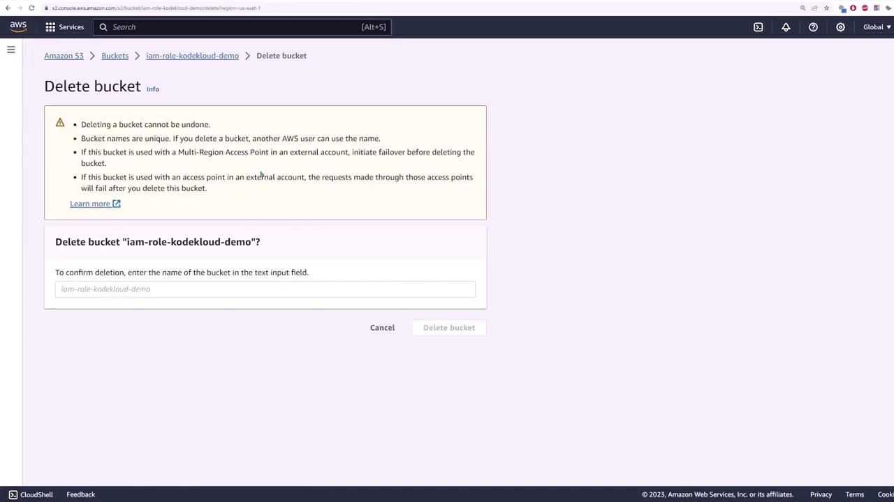 The image shows an AWS S3 console page for deleting a bucket named "iam-role-kodekloud-demo," with warnings about the action being irreversible and requiring confirmation by entering the bucket name.