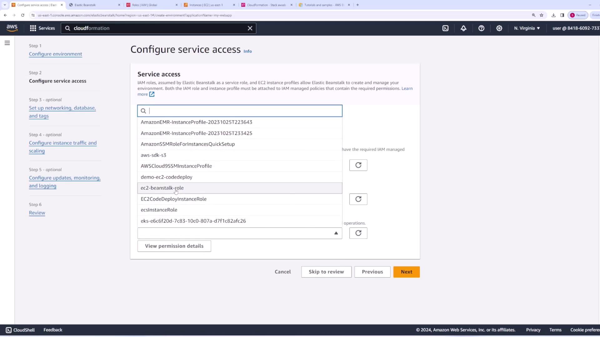 The image shows an AWS Elastic Beanstalk configuration screen where a user is selecting a service access role from a dropdown menu. Various IAM roles are listed for selection.
