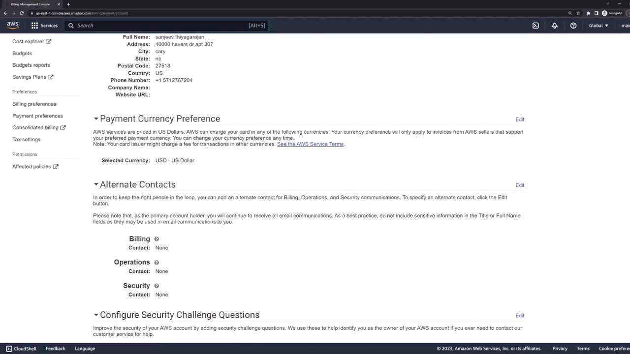 The image shows an AWS Billing Management Console screen displaying account details, payment currency preference, and options for alternate contacts and security challenge questions.