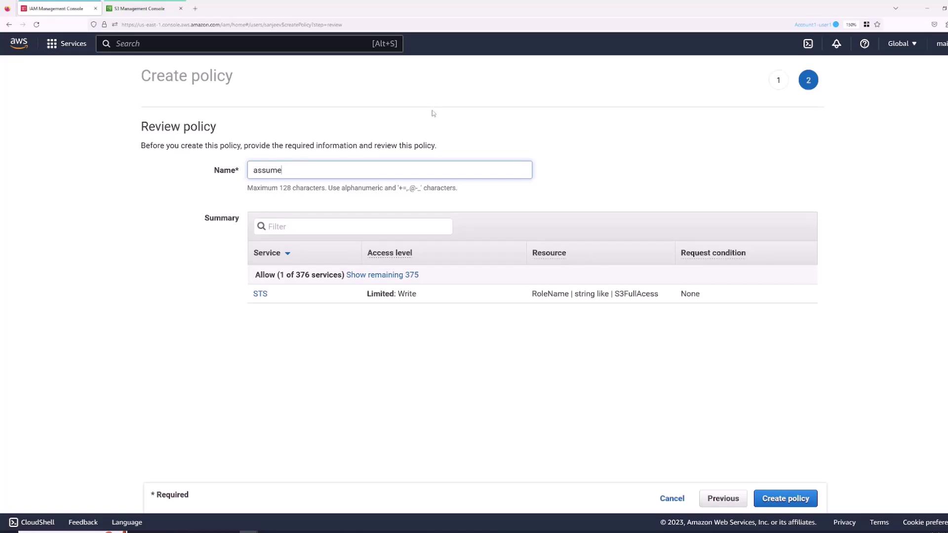 The image shows the AWS IAM Management Console where a user is reviewing a policy named "assume" with specific permissions for the STS service.