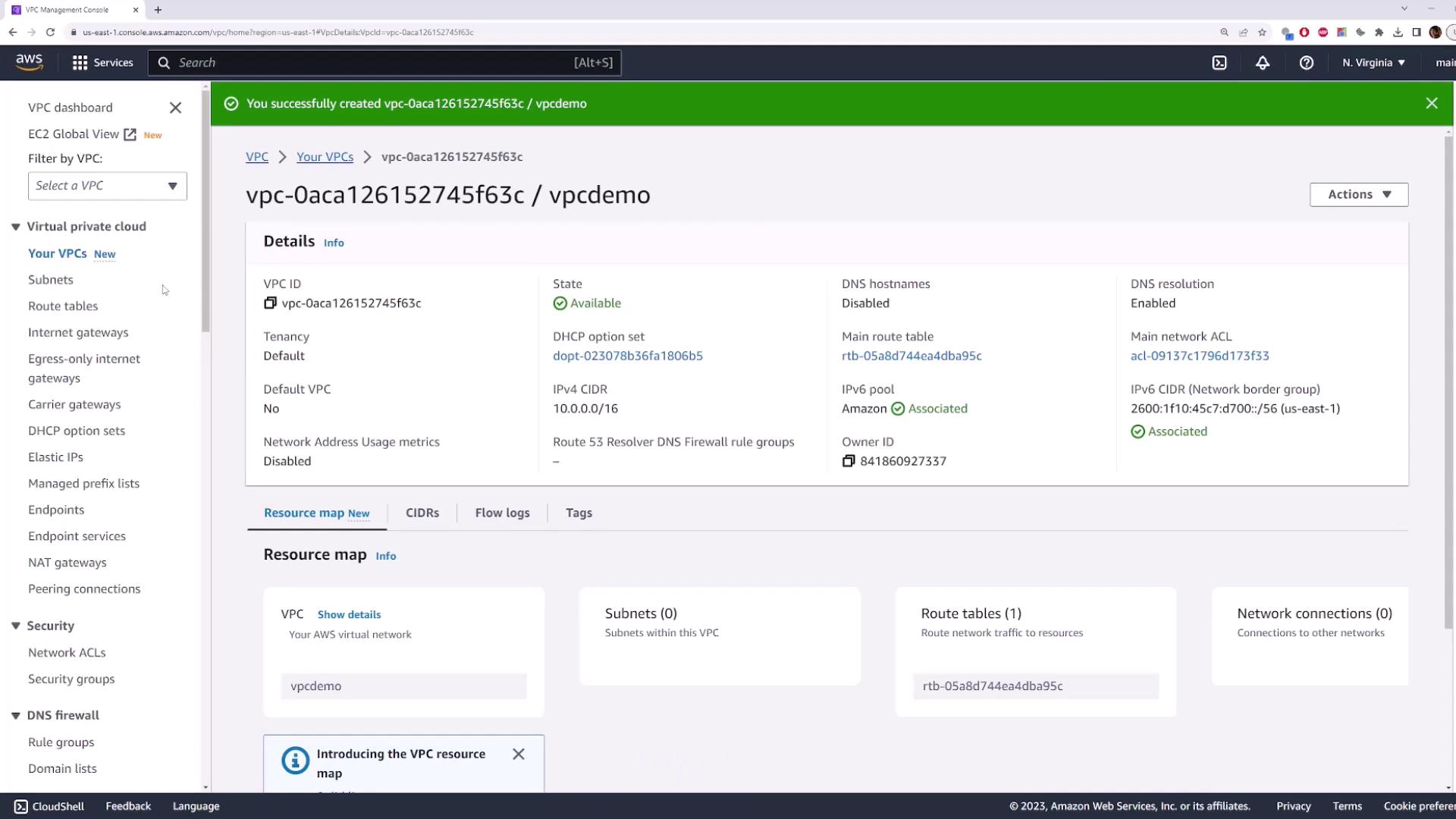 The image shows an AWS Management Console screen displaying details of a Virtual Private Cloud (VPC) named "vpcdemo," including its state, CIDR block, and associated resources.