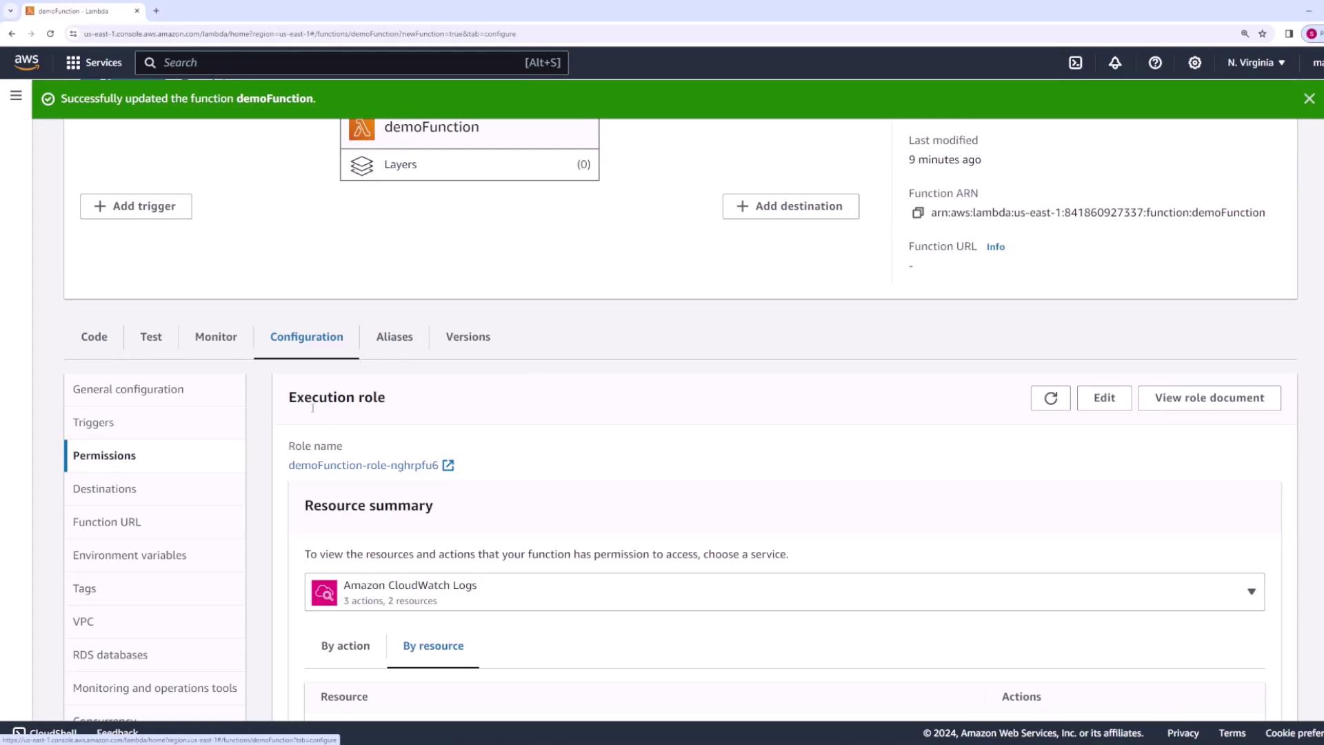 The image shows an AWS Lambda console screen with a function named "demoFunction" and its configuration details, including execution role and permissions.
