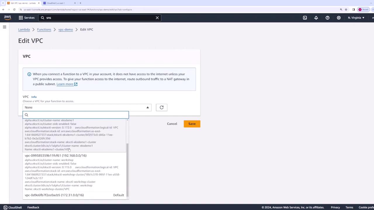 The image shows an AWS Lambda interface where a user is editing the VPC settings for a function. A dropdown menu is open, displaying various VPC options to select from.