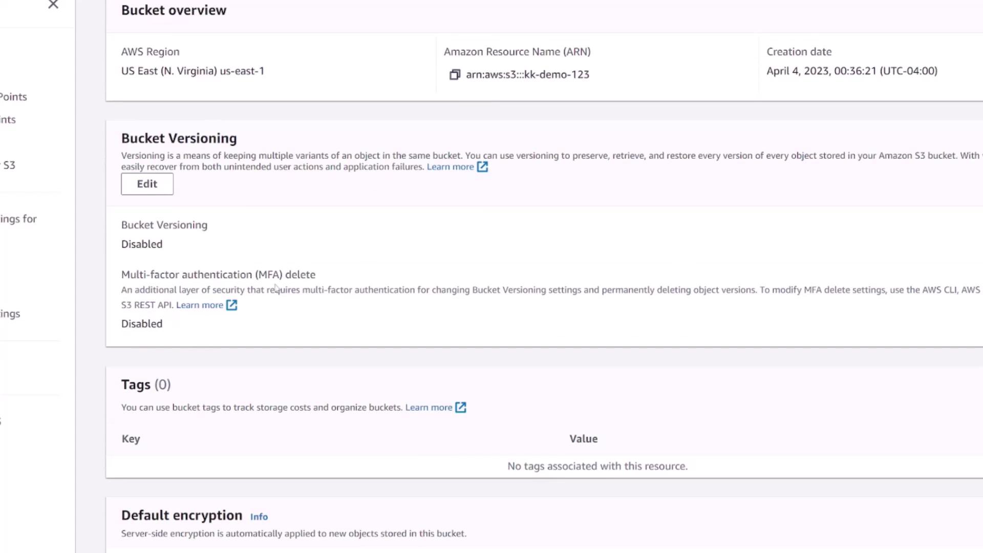 The image shows an AWS S3 bucket overview with details about bucket versioning, multi-factor authentication, tags, and default encryption settings.