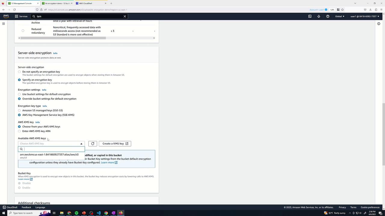 The image shows a screenshot of the AWS Management Console, specifically the section for configuring server-side encryption settings for an S3 bucket. It includes options for specifying encryption keys and using AWS Key Management Service (KMS).