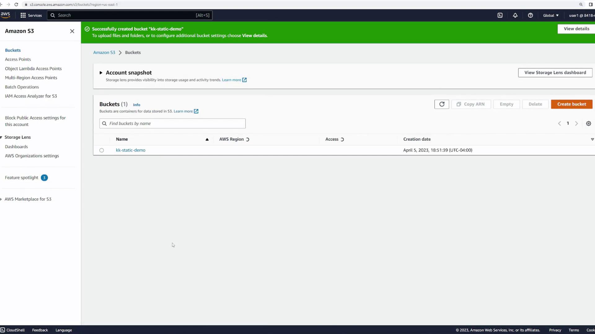 The image shows an Amazon S3 console with a notification of a successfully created bucket named "kk-static-demo." The interface displays options for managing buckets and storage settings.