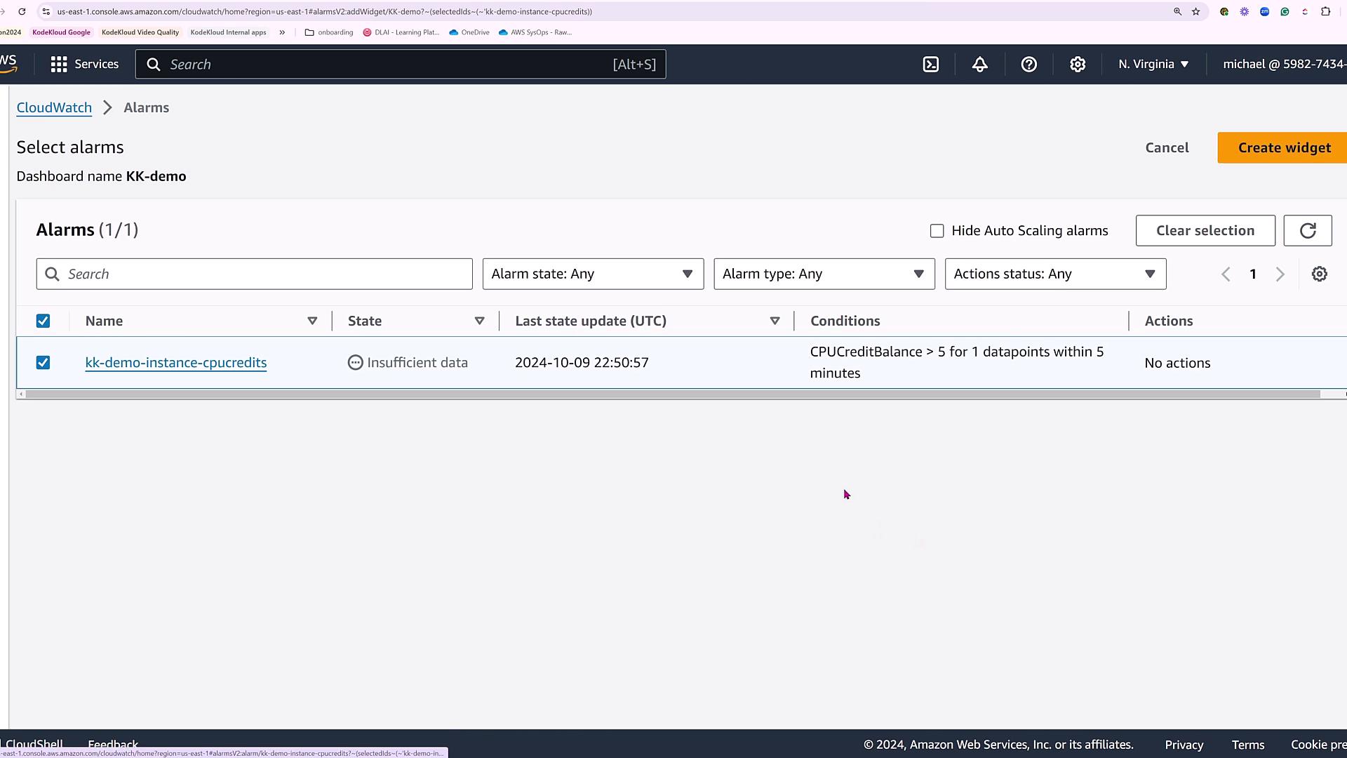 The image shows an AWS CloudWatch Alarms dashboard with one alarm named "kk-demo-instance-cpucredits" in a state of "Insufficient data." The condition is set for CPUCreditBalance to be greater than 5 for one datapoint within 5 minutes.