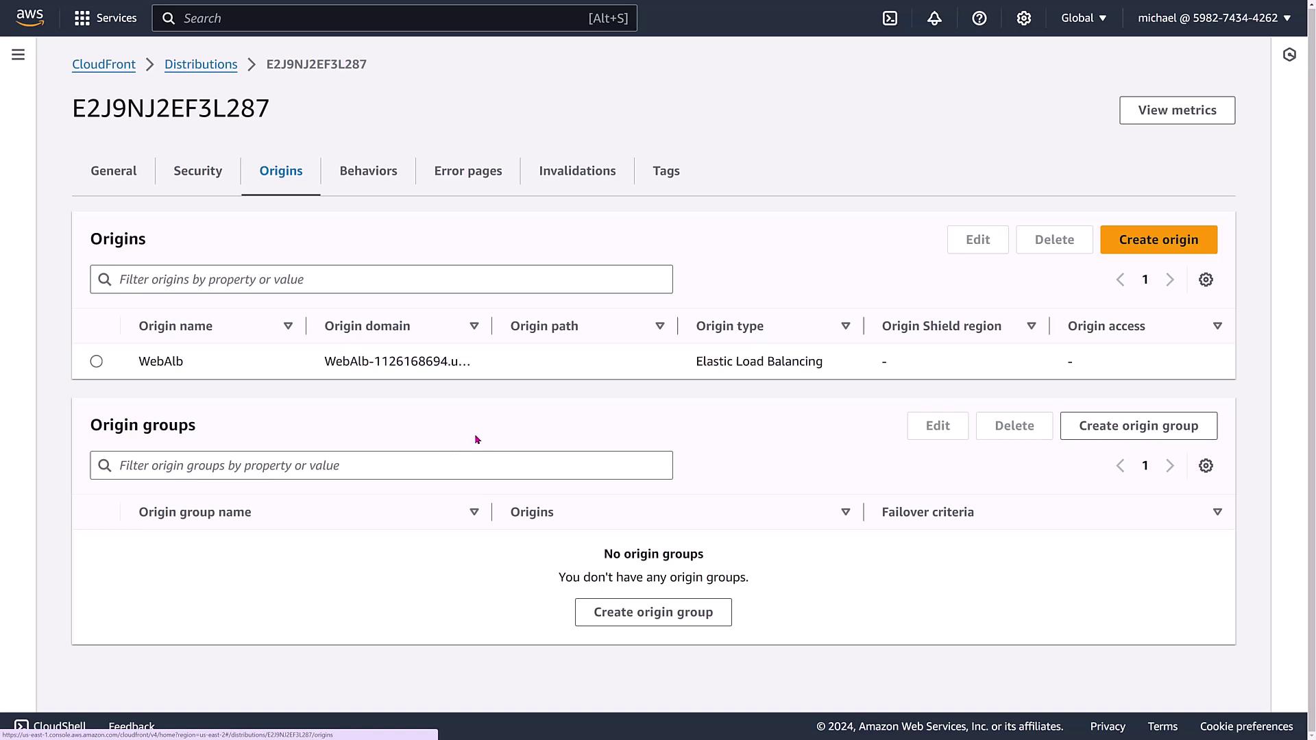 The image shows an AWS CloudFront console page displaying the "Origins" tab for a specific distribution, with options to edit, delete, or create origins and origin groups.