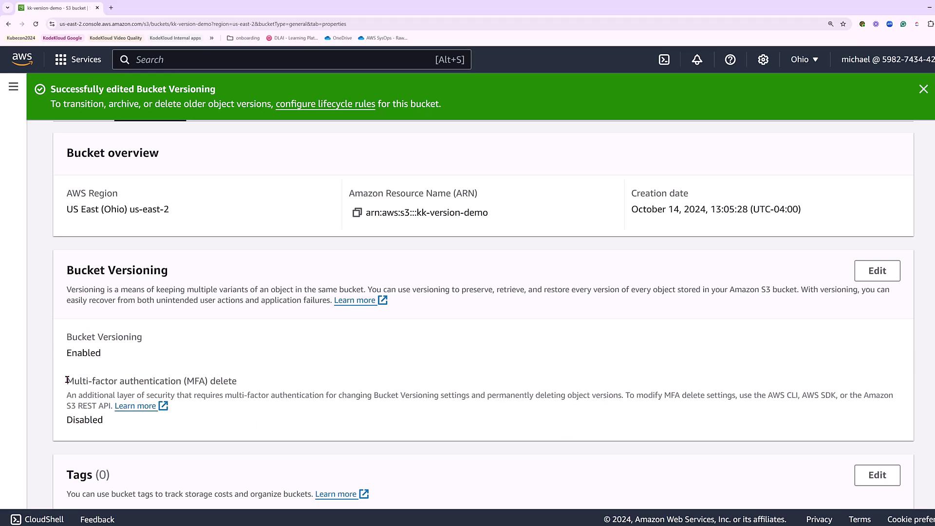 The image shows an AWS S3 bucket configuration page with versioning enabled and multi-factor authentication delete disabled. It includes details like the AWS region, Amazon Resource Name (ARN), and creation date.