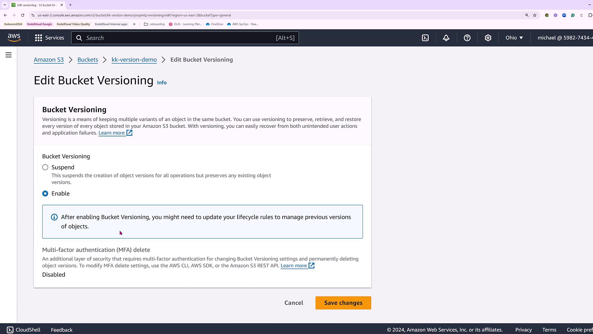 The image shows the AWS S3 console interface for editing bucket versioning settings, with options to enable or suspend versioning and a note about updating lifecycle rules.