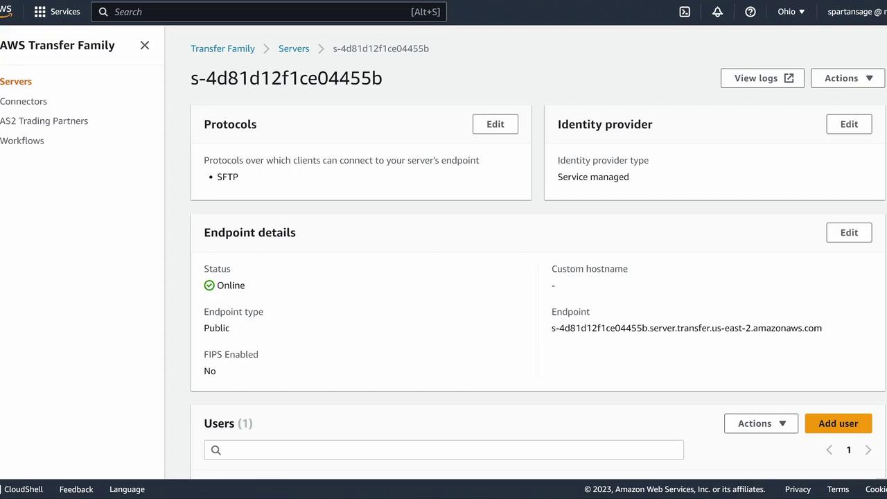 The image shows an AWS Transfer Family server dashboard, displaying server details like protocols, endpoint status, identity provider, and user management options.