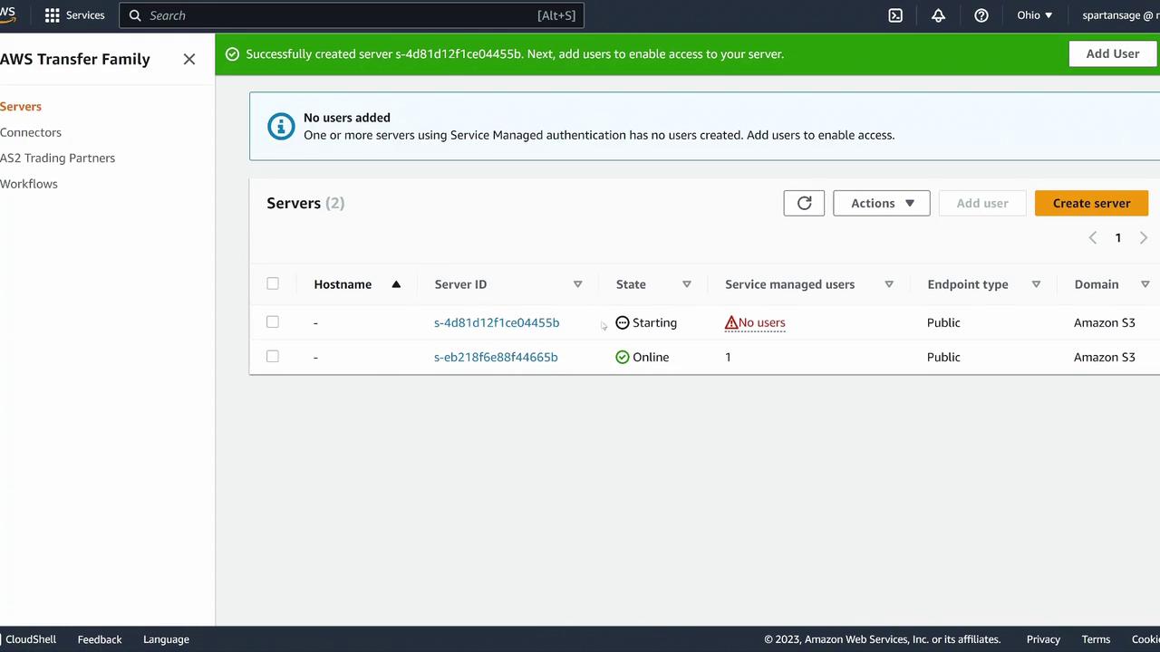 The image shows an AWS Transfer Family dashboard with two servers listed, one starting and one online, with a notification about adding users.