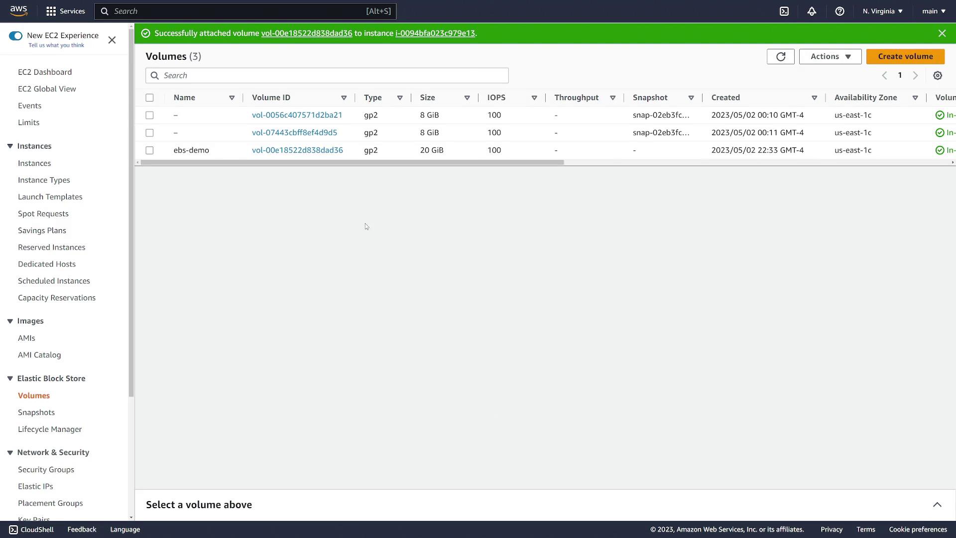 The image shows an AWS EC2 dashboard displaying details of three EBS volumes, including volume IDs, types, sizes, and availability zones.