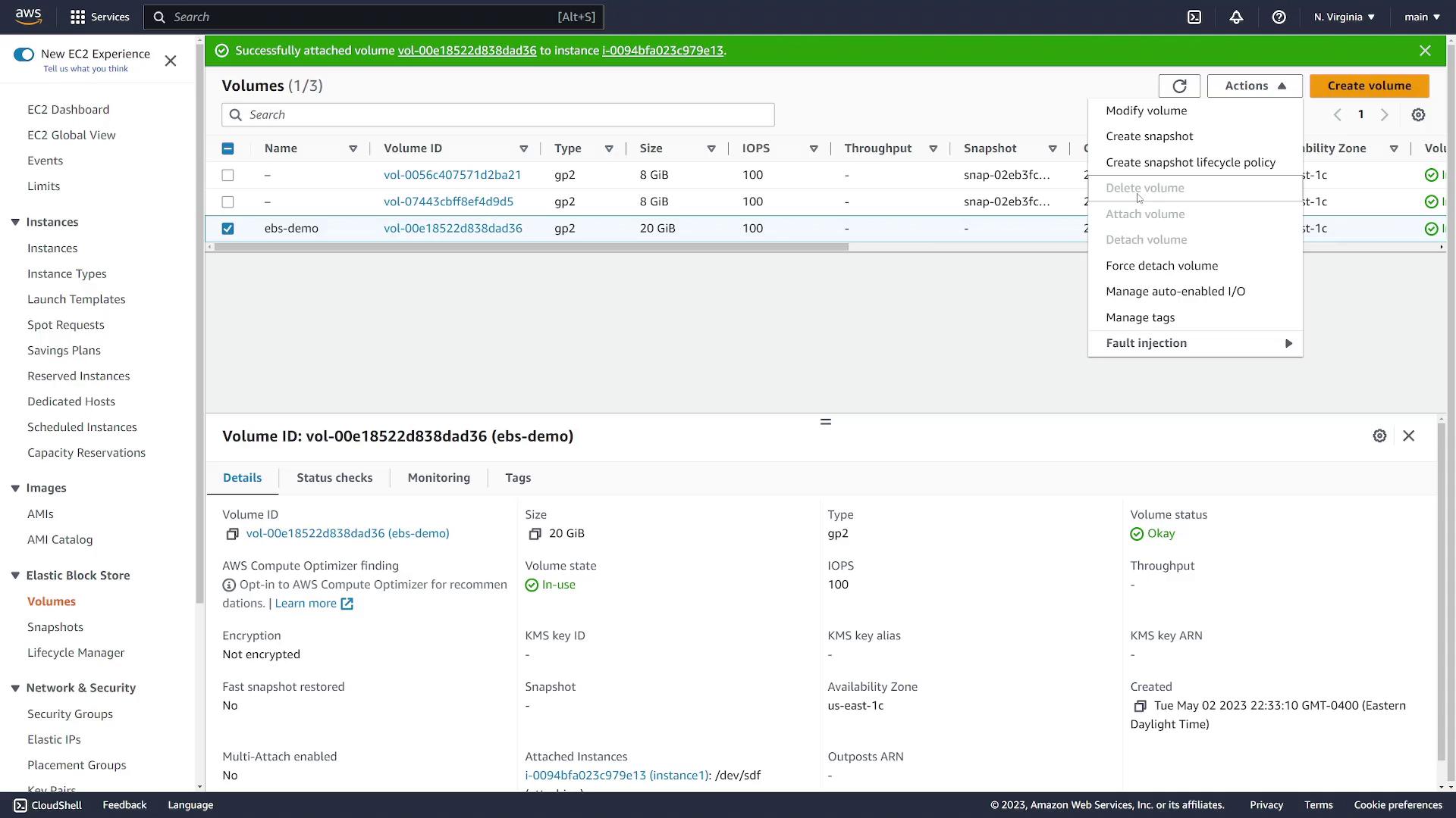 The image shows an AWS EC2 dashboard with details of an EBS volume, including its ID, size, type, and status, along with available actions.