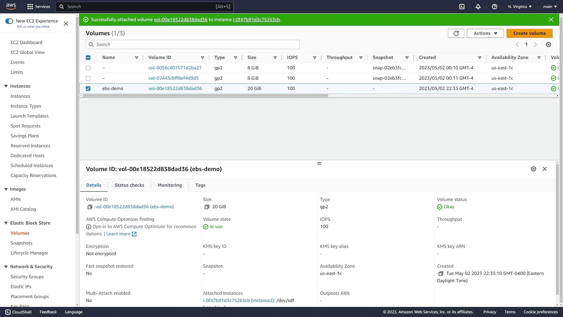 The image shows an AWS EC2 dashboard with details of an EBS volume, including its ID, size, type, and status.