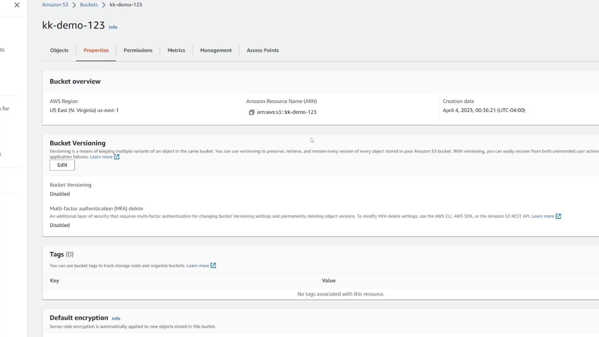 The image shows the properties tab of an Amazon S3 bucket named "kk-demo-123," with details on versioning, MFA delete, and tags.