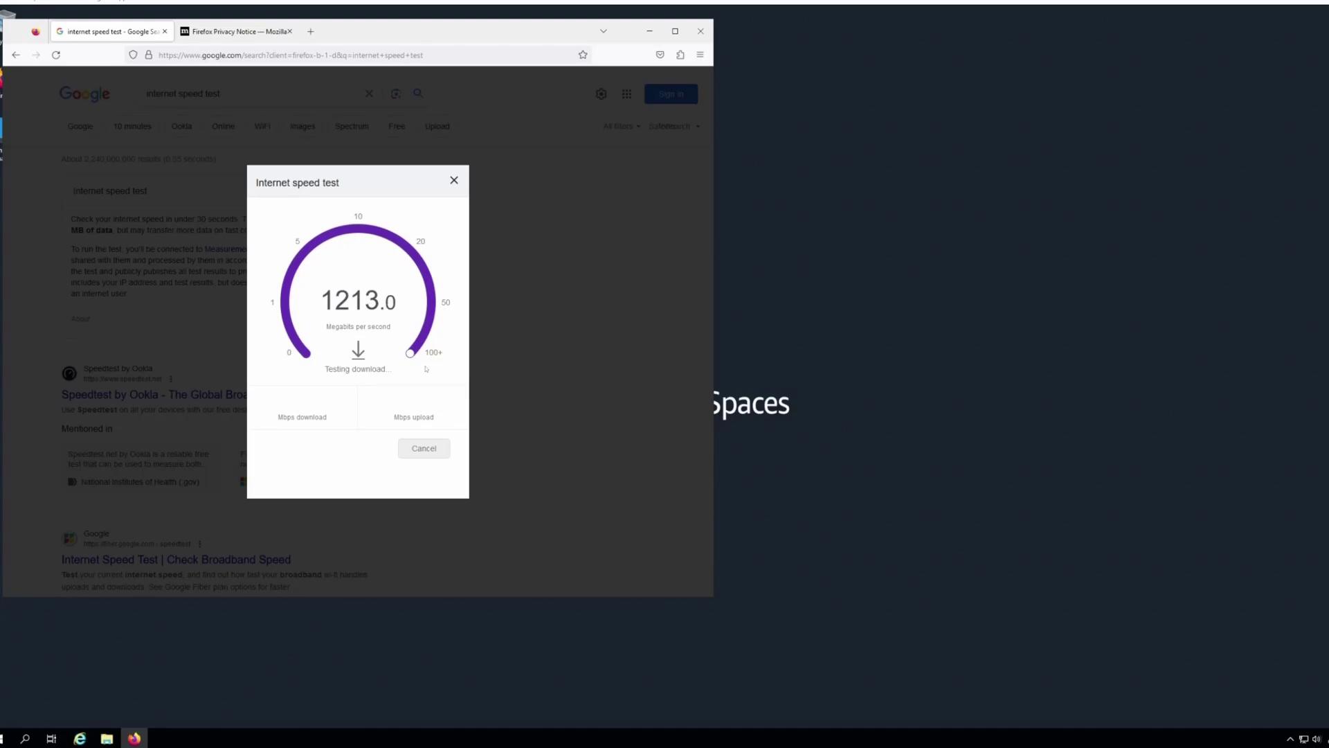 The image shows an internet speed test in progress, displaying a download speed of 1213.0 Mbps on a computer screen.