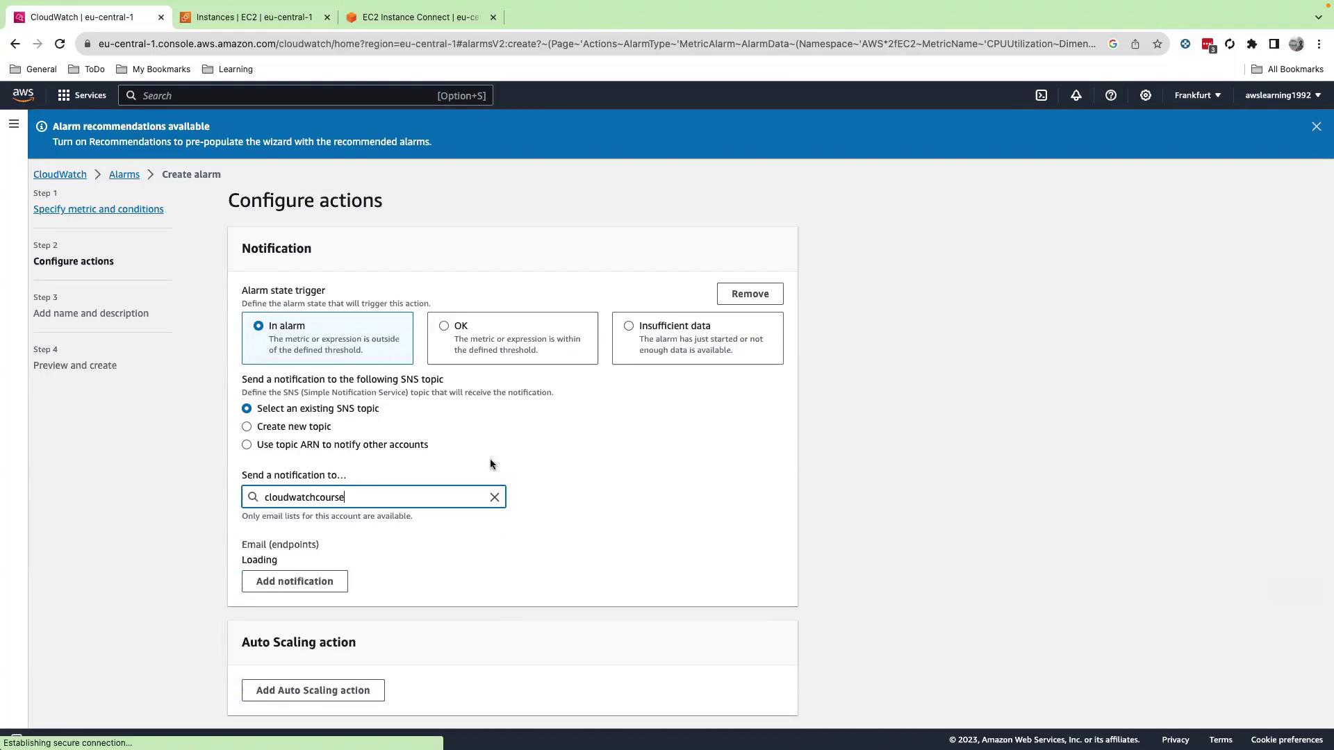 The image shows an AWS CloudWatch interface where a user is configuring actions for an alarm, including setting notifications via SNS topics.