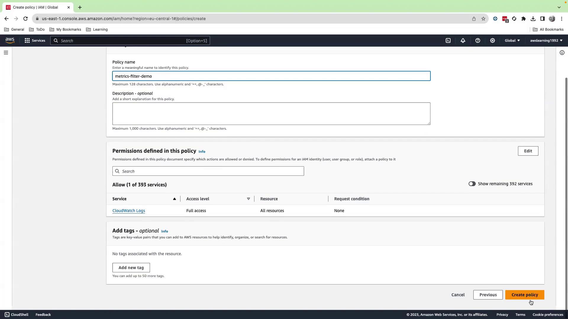 The image shows an AWS IAM policy creation page, where a policy named "metrics-filter-demo" is being configured with full access to CloudWatch Logs.