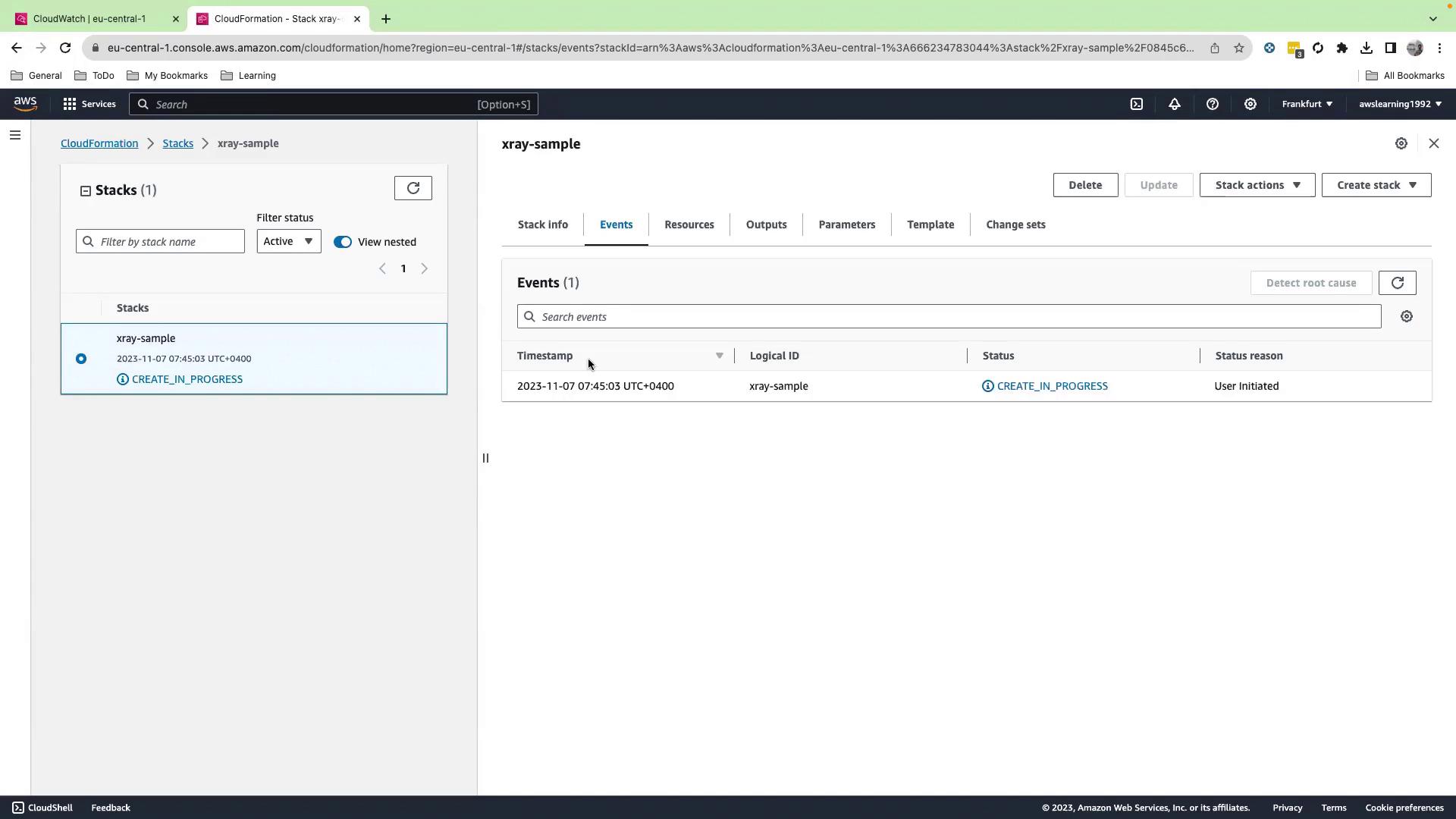The image shows an AWS CloudFormation console with a stack named "xray-sample" in the process of being created. The status is "CREATE_IN_PROGRESS" and the event is user-initiated.