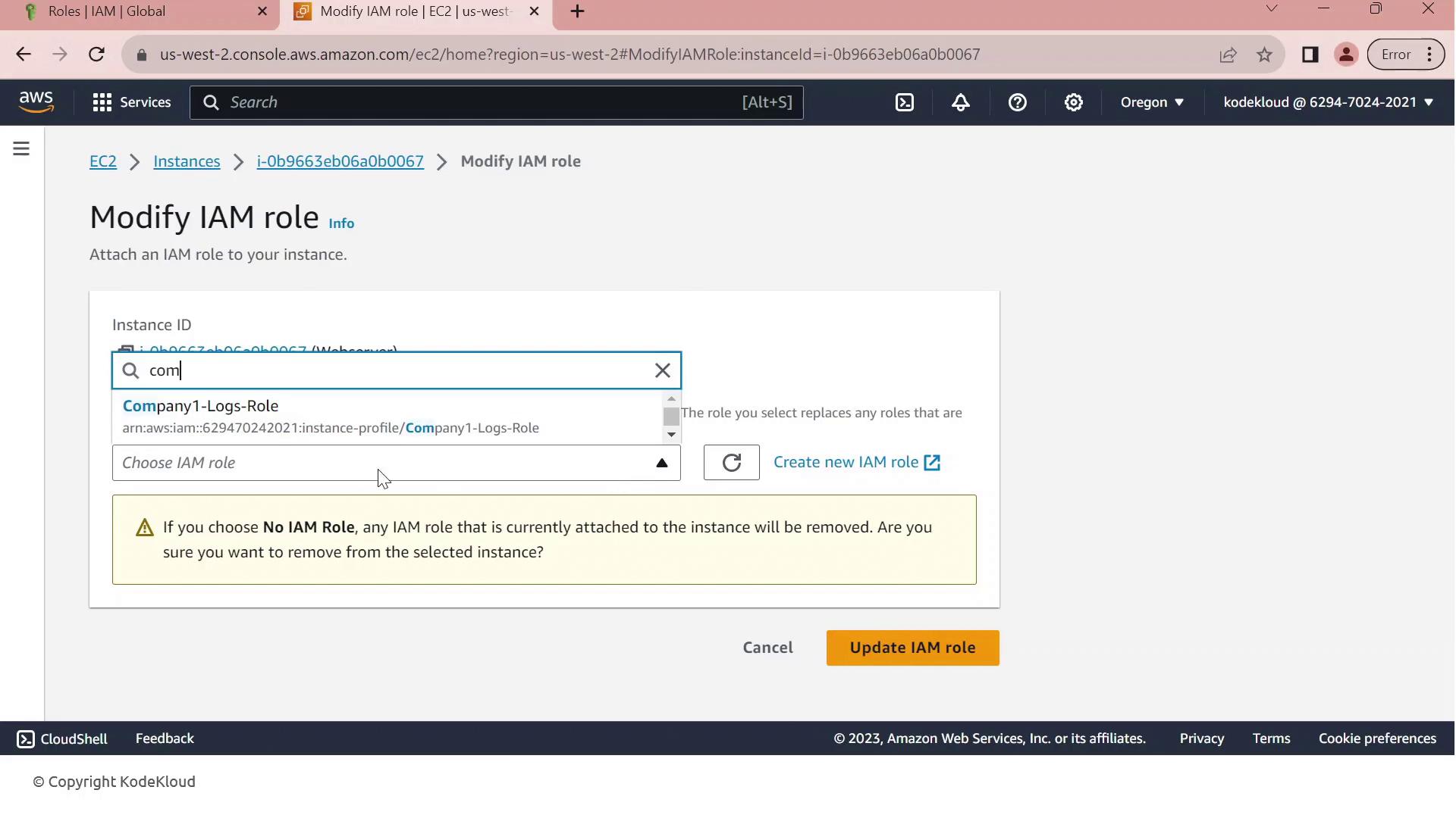 The image shows an AWS console interface for modifying an IAM role attached to an EC2 instance. It includes a dropdown to select an IAM role and a warning about removing existing roles.