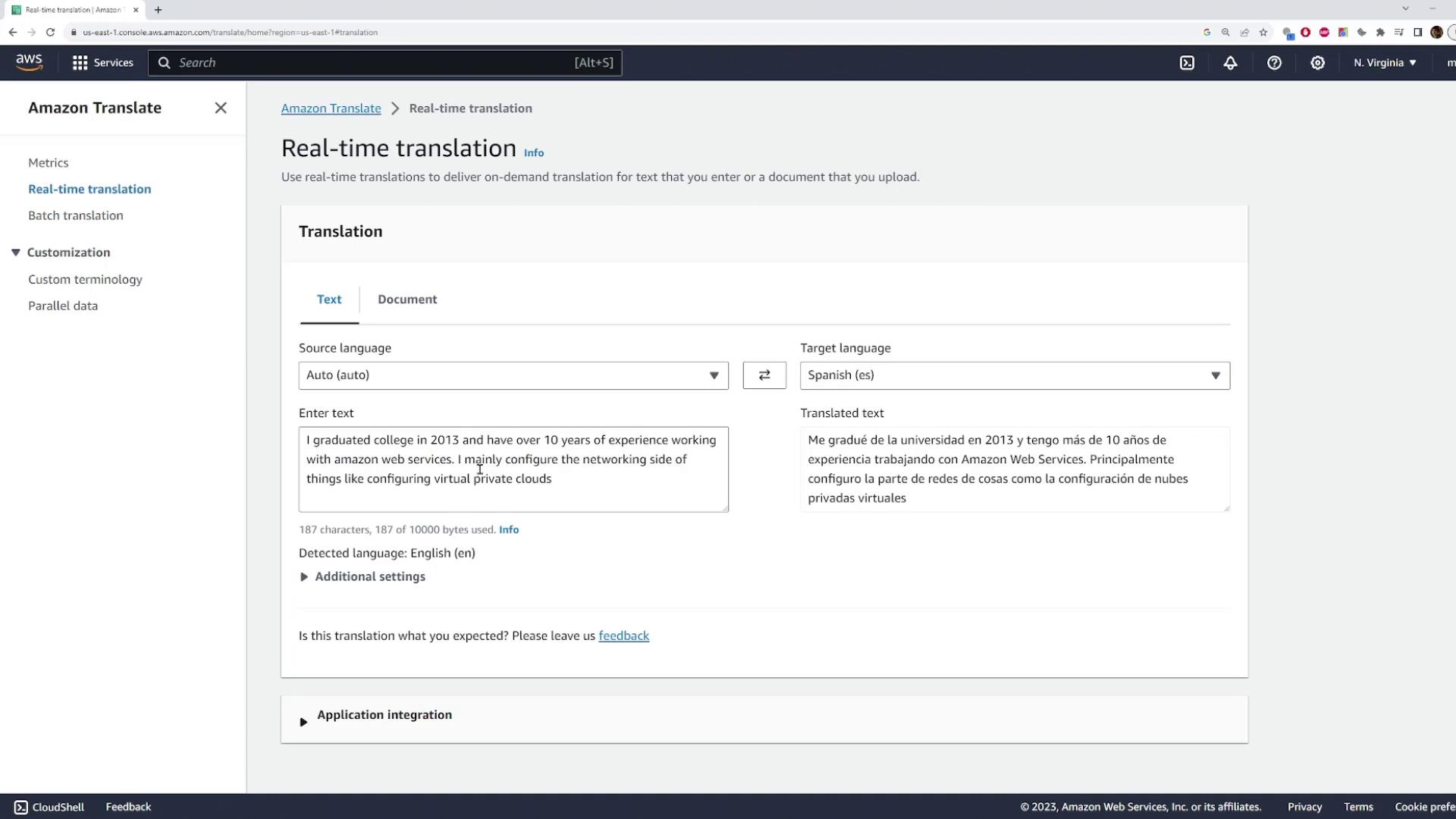 The image shows the Amazon Translate interface, where text is being translated from English to Spanish in real-time. The source text discusses experience with Amazon Web Services, and the translated text is displayed on the right.