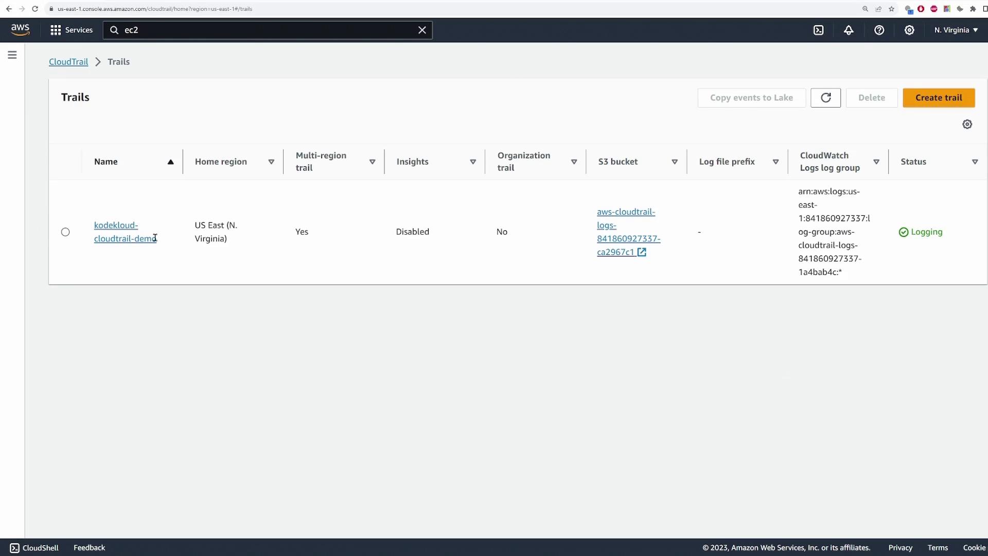The image shows an AWS CloudTrail console with a trail named "kodekloud-cloudtrail-demo" in the US East (N. Virginia) region, indicating that logging is enabled.
