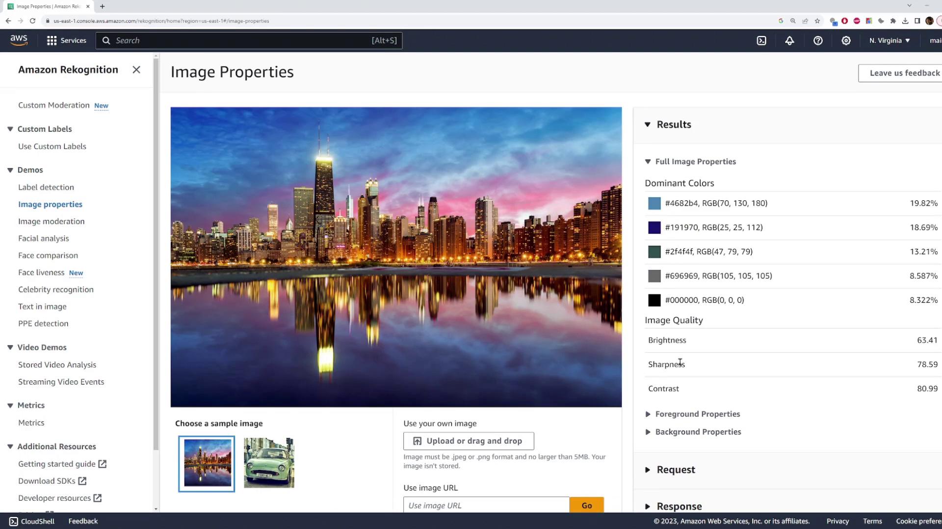 The image shows a screenshot of the Amazon Rekognition console displaying image properties for a cityscape photo, including dominant colors and image quality metrics.