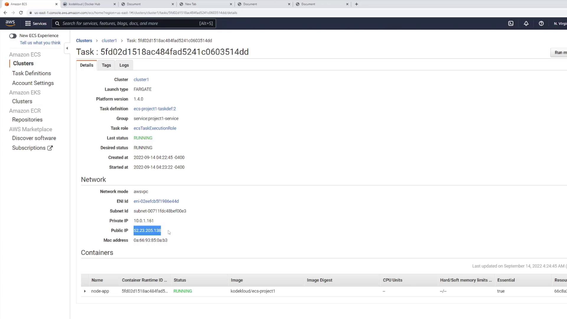 The image shows an Amazon ECS task details page, displaying information about a running task, including network settings and container status.