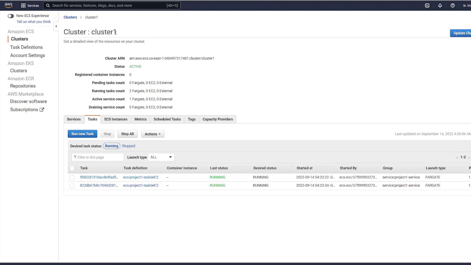 The image shows an AWS ECS (Elastic Container Service) dashboard displaying details of a cluster named "cluster1," including task statuses and configurations. It lists two running tasks with their respective details such as task definition, status, and launch type.