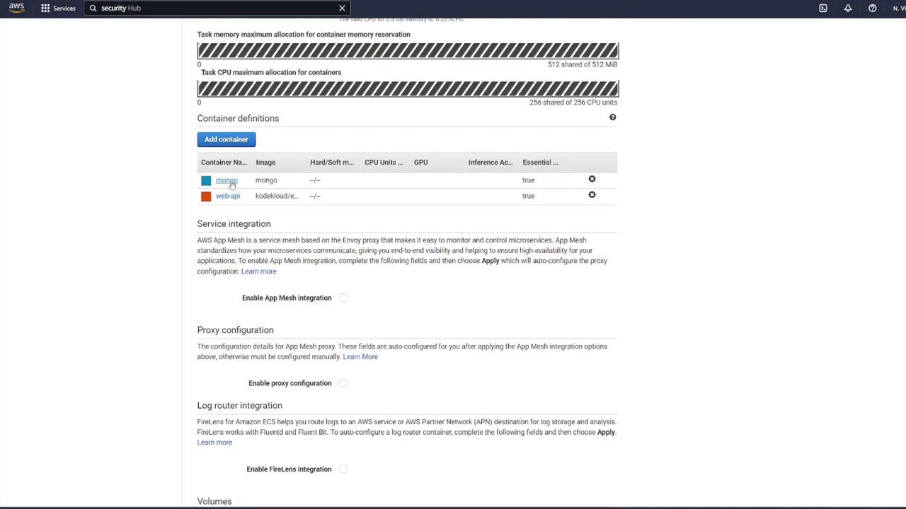 The image shows an AWS management console interface for configuring container definitions, including memory and CPU allocations, with options for service integration, proxy configuration, and log router integration.
