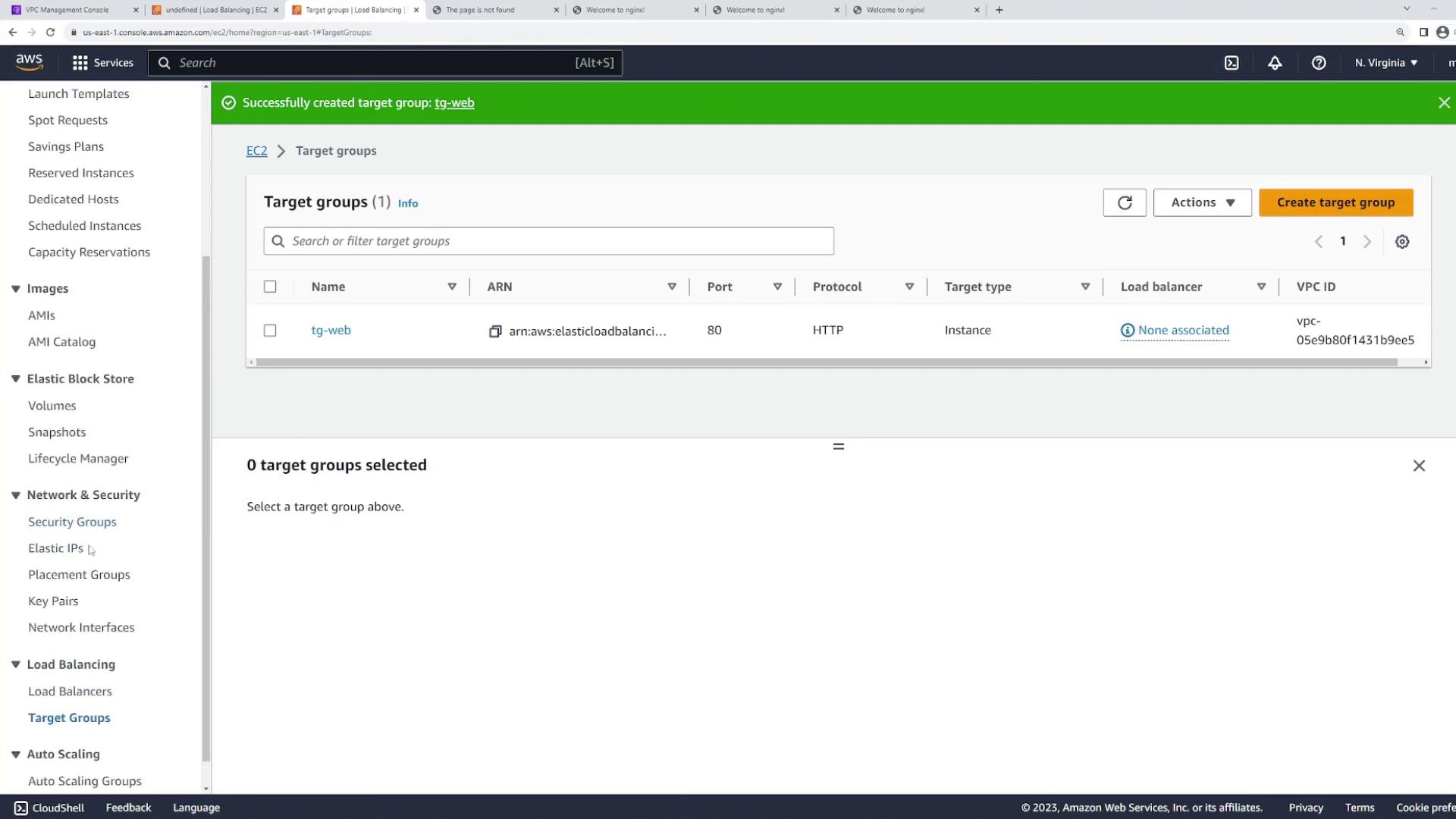 The image shows an AWS Management Console screen displaying a successfully created target group named "tg-web" with details such as protocol, port, and VPC ID.