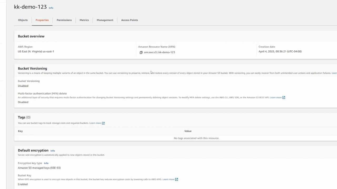 The image shows the properties page of an Amazon S3 bucket named "kk-demo-123," displaying details about bucket versioning, tags, and default encryption settings.