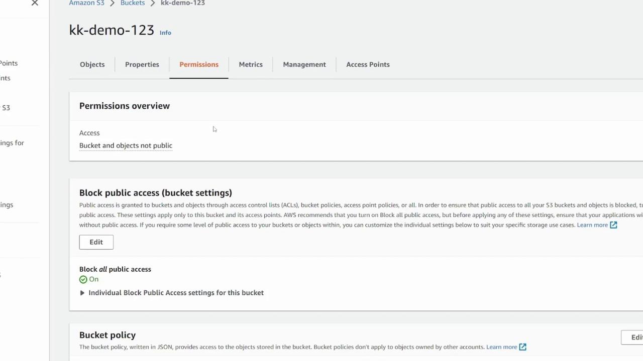 The image shows the permissions settings for an Amazon S3 bucket named "kk-demo-123," indicating that the bucket and its objects are not public. It includes options to block public access and edit bucket policies.