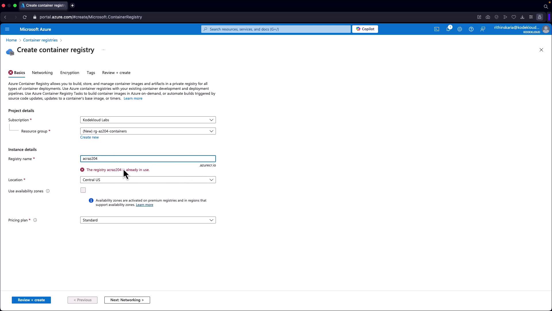 The image shows the "Create container registry" page on Microsoft Azure, where a user is attempting to set up a new container registry. An error message indicates that the chosen registry name is already in use.