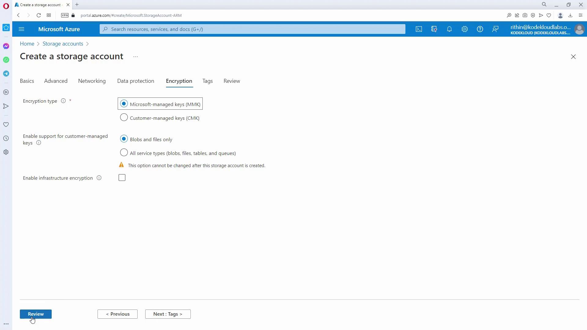 The image shows a Microsoft Azure portal page for creating a storage account, specifically on the "Encryption" tab, where options for encryption type and customer-managed keys are being configured.