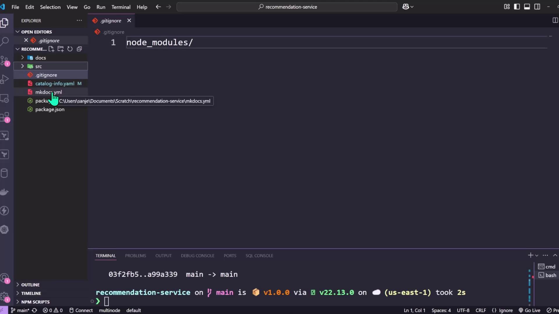The image shows a Visual Studio Code interface with a `.gitignore` file open, containing the entry `node_modules/`. The file explorer on the left displays a project structure with various files and folders.
