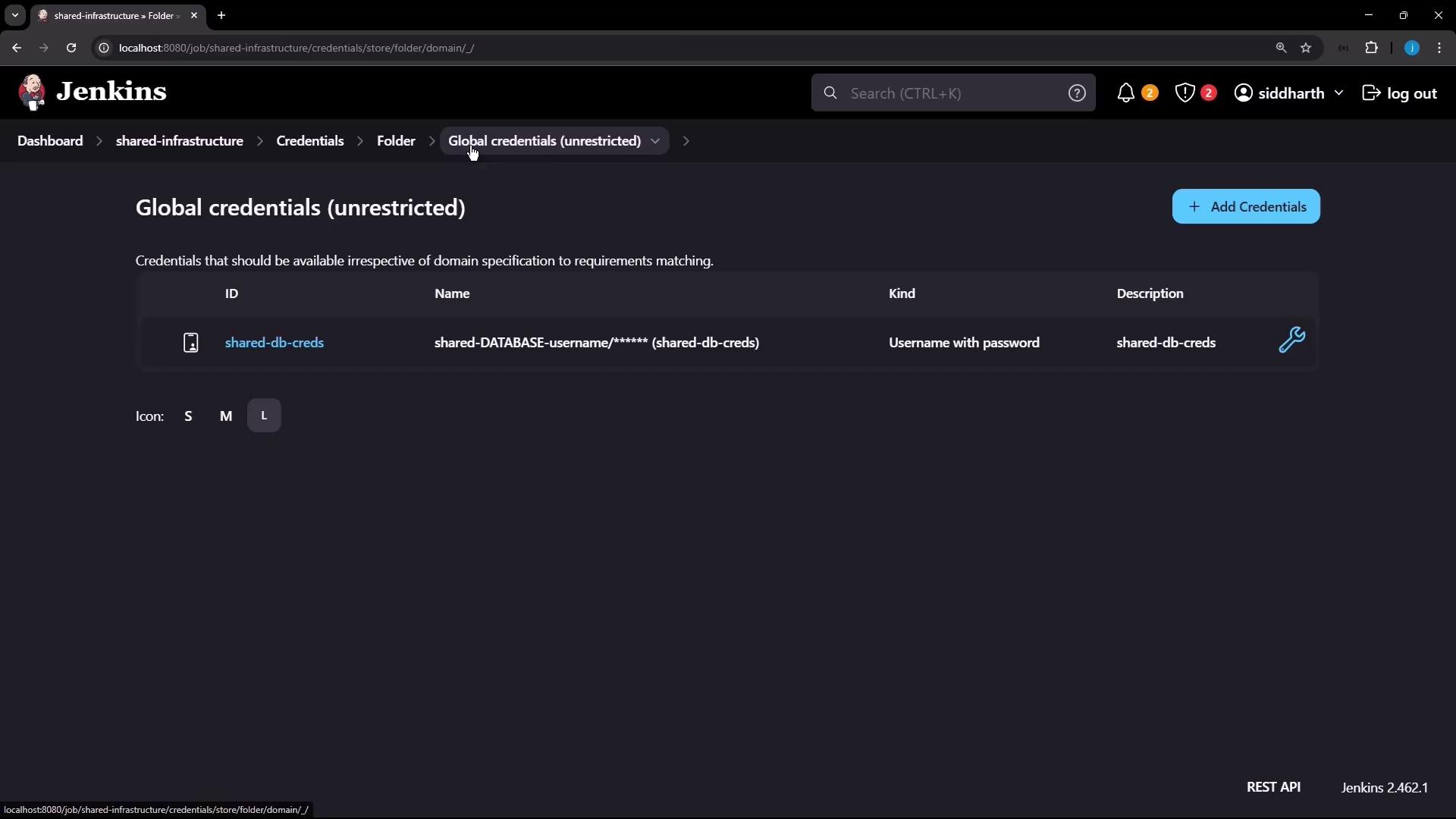 The image shows a Jenkins interface displaying global credentials, specifically a shared database credential with a username and password.