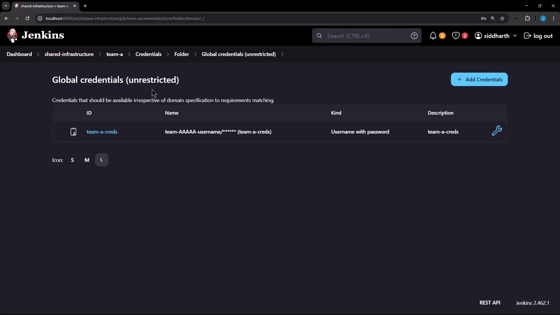 The image shows a Jenkins interface displaying global credentials, specifically a username with a password for "team-a-creds."